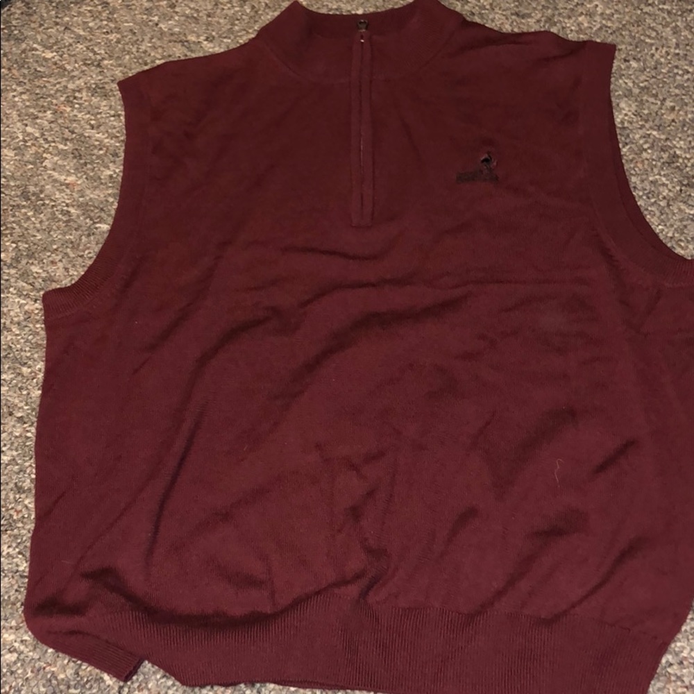 Used vest by Greg Norman size L